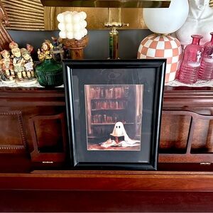 Cute Spooky Ghost Reading a Book in a Library Canvas Print Black Framed Wall Art